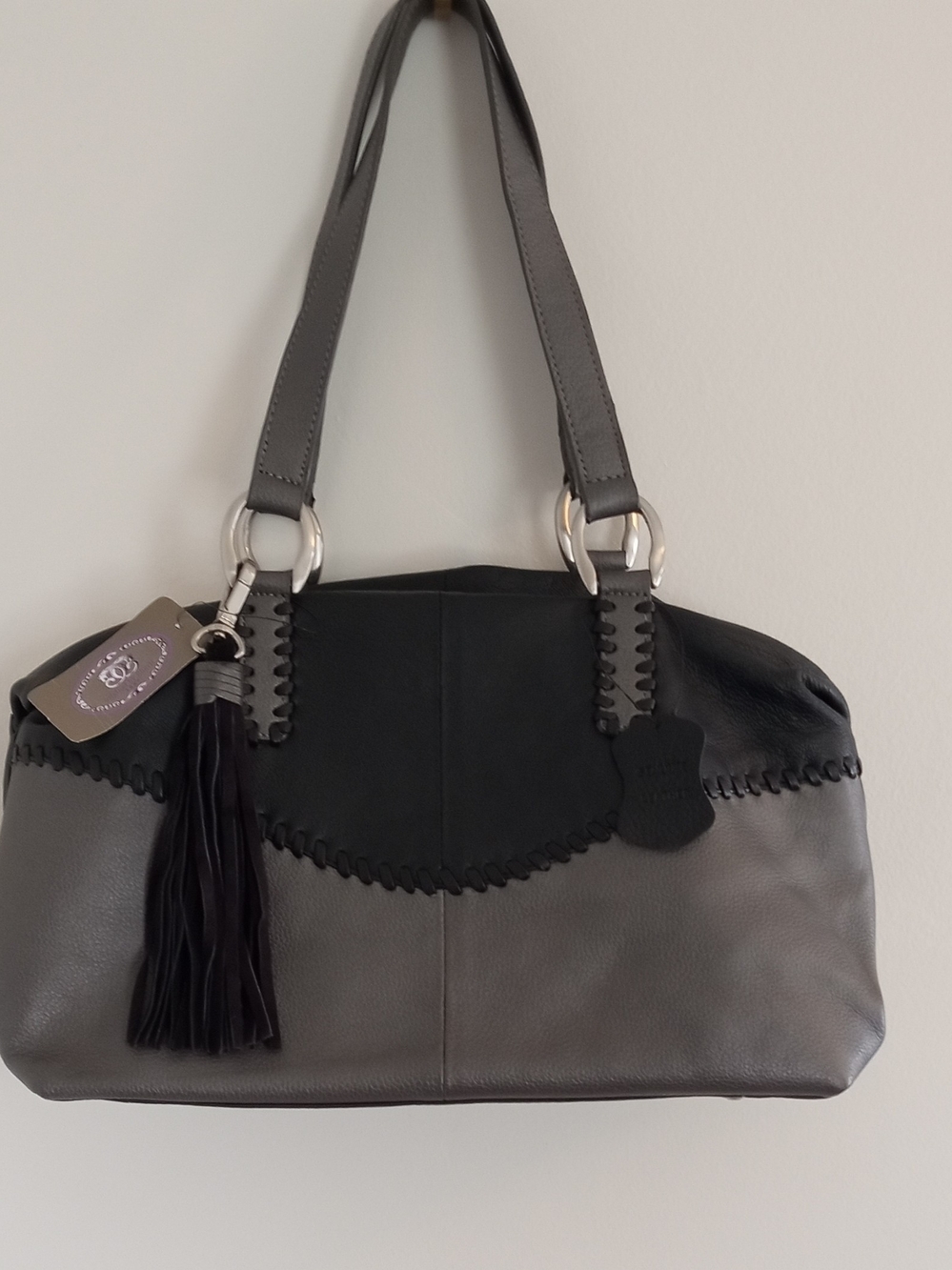 Two-Tone Gray and Black Shoulder Bag with Tassel Accent